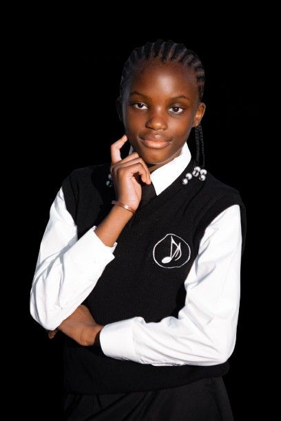 Student portrait, Robin's Conservatory uniform